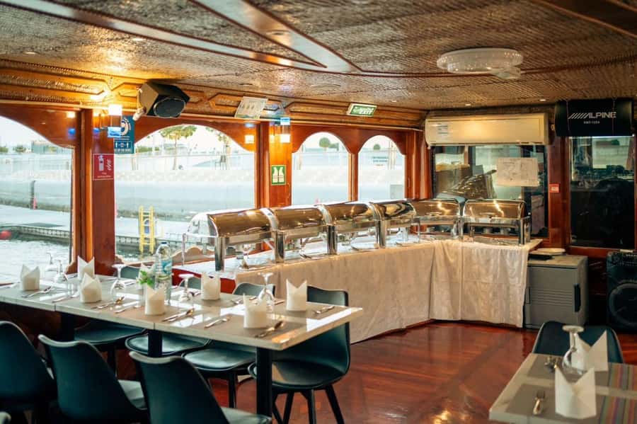 Dubai: Scenic Dhow Cruise with Buffet Dinner and Live Shows - Dinner with creek views