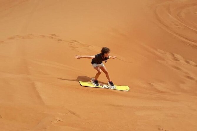 Dubai Self-drive Quad Bike, Sand Boarding, Camels & Refreshments - Camel riding at the Bedouin-style camp
