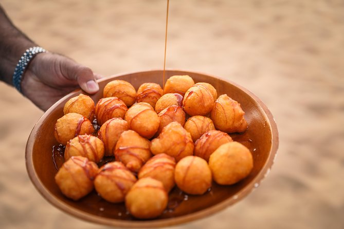 Dubai Sunset Camel Trekking with Shows & BBQ Dinner - Buffet BBQ dinner and drinks