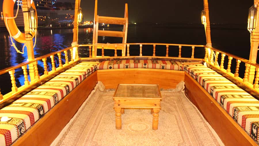 Dubai: Sunset Cruise on Traditional Boat & Emirati High Tea - Arabic music, commentary, and the overall mood