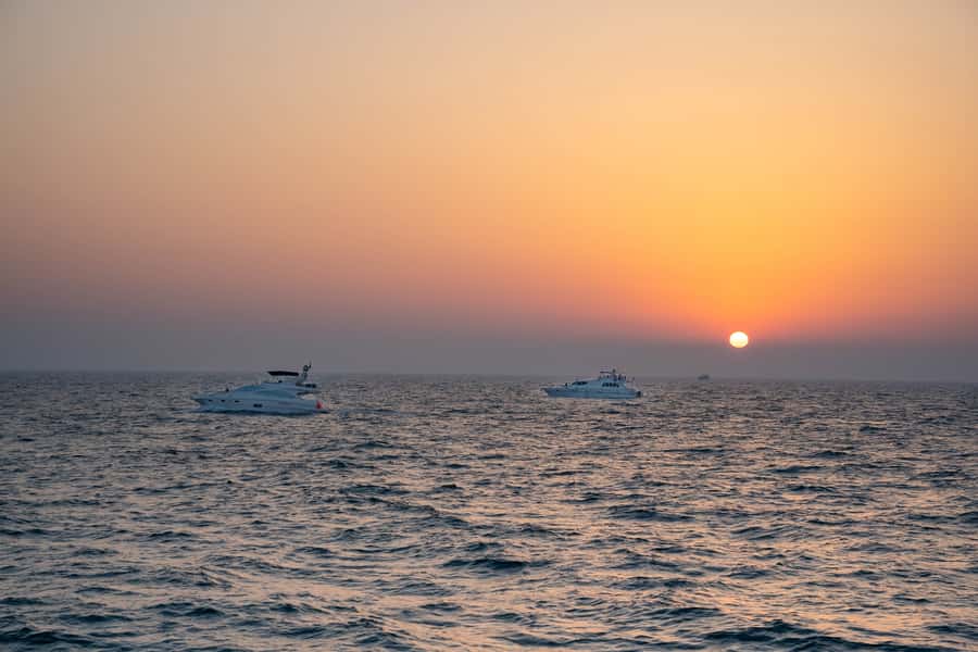 Dubai: Sunset & Night Cruise with Bites and Drinks - Included drinks and the real value of $67