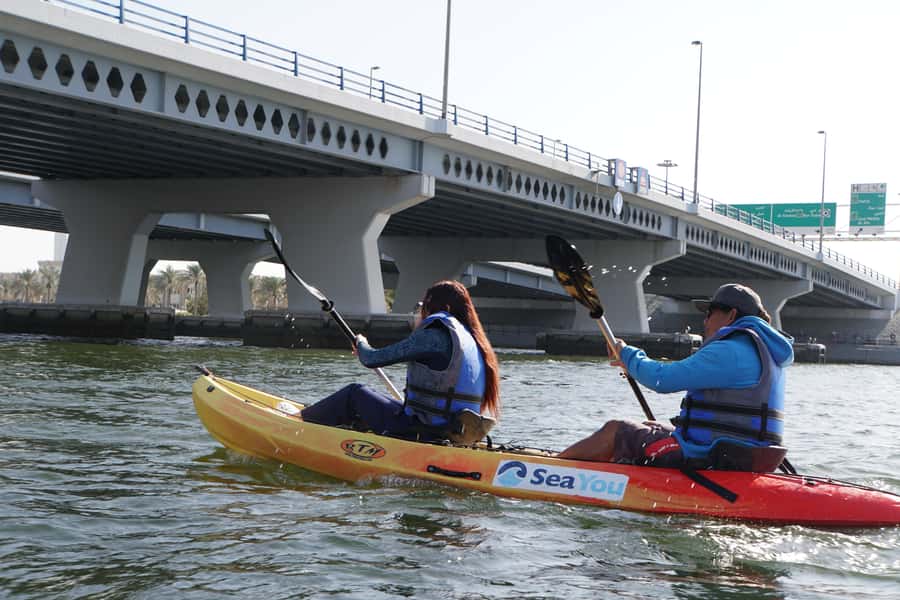 Dubai: Sunset/Night Dubai Creek Kayak Tour - Safety briefing, life jacket, and first paddle