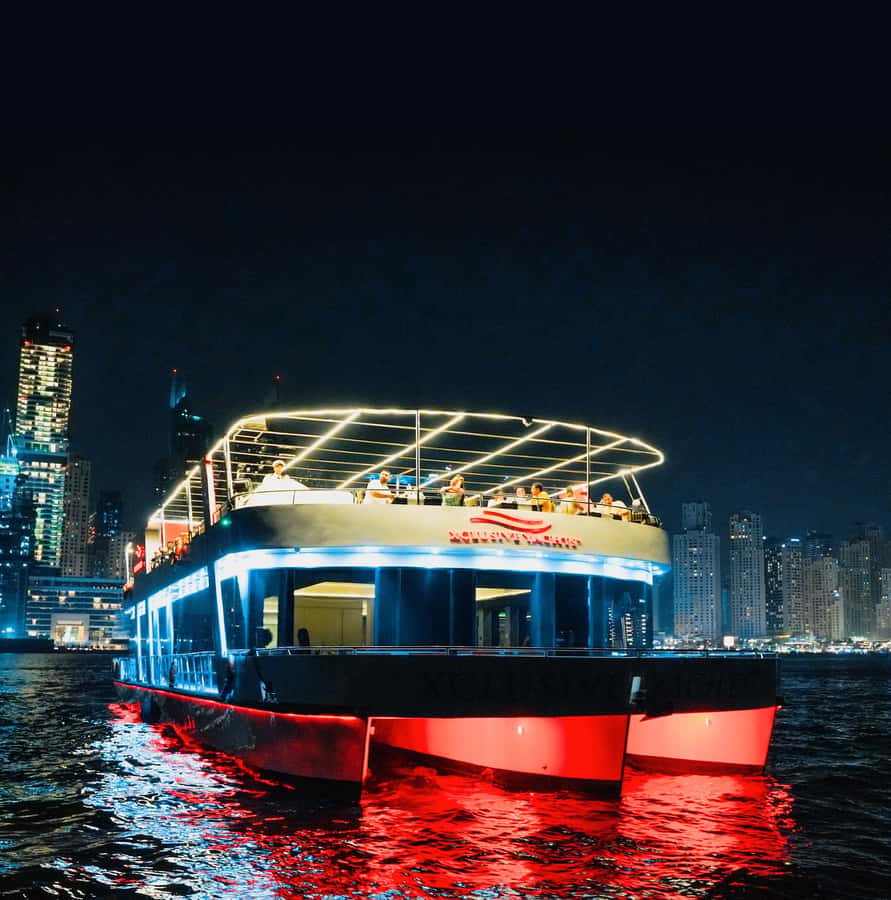 Dubai: Sunset or Dinner Cruise with Live Music & Open Bar - Cruising Dubai Marina as the city lights come on