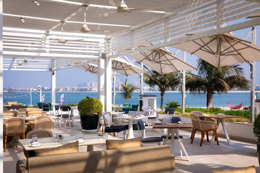 Dubai: The Palm Saturday Brunch with Unlimited Food & Drinks - Outdoor seating and the Palm atmosphere