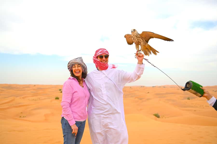 Dubai: Tour with BBQ Dinner, Camel Ride, & Traditional Show - Tanoura, belly dancing, and an evening under the stars