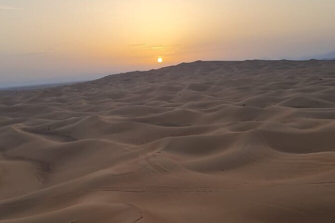 Dubai: Unique SUNRISE 4WD Red Dunes Safari - Sandboarding on the dune slopes