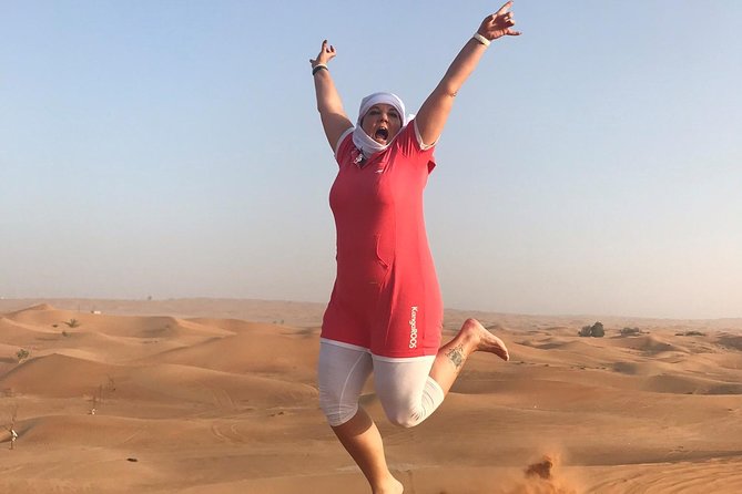 Dubai: Unique SUNSET 4WD Red Dunes Safari - The camel ride slows the afternoon down