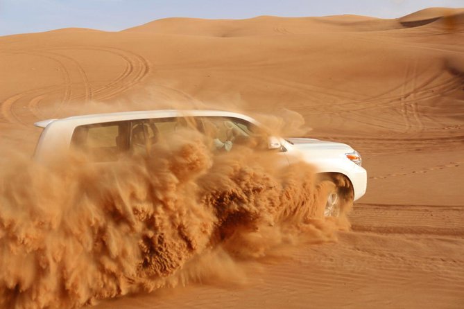 Dubai: Unique SUNSET 4WD Red Dunes Safari - BBQ dinner at the traditional camp