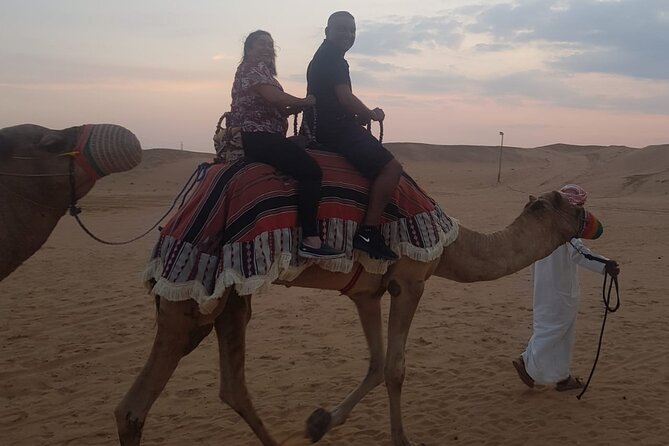 Dubai: Unique SUNSET 4WD Red Dunes Safari - Henna, shisha, and the evening show