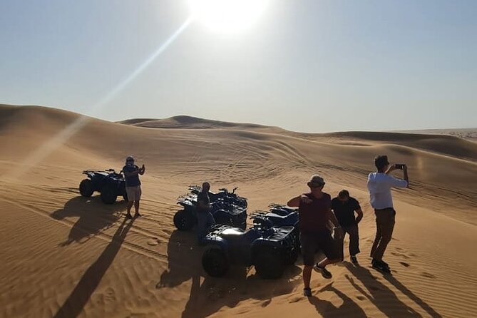 Dubai Unique Sunset Combo: 4WD and Quad Bike Red Dunes Safari - Sandboarding and the highest dune photo stop