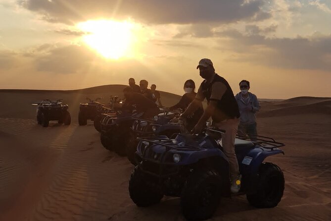 Dubai Unique Sunset Combo: 4WD and Quad Bike Red Dunes Safari - Camel ride, water, and the slower desert moments