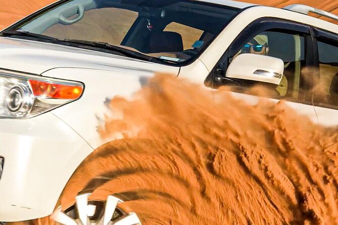 Dubai Unique Sunset Combo: 4WD and Quad Bike Red Dunes Safari - Pickup first, then a change of pace