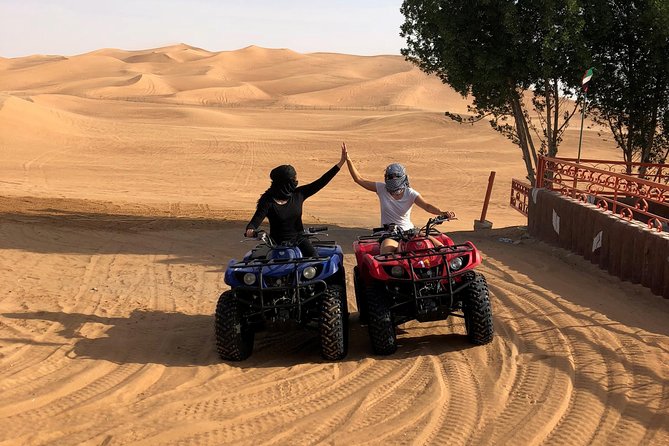 Dubai: Unique SUNSET Quad Bike Red Dunes Safari - Key points to know before booking