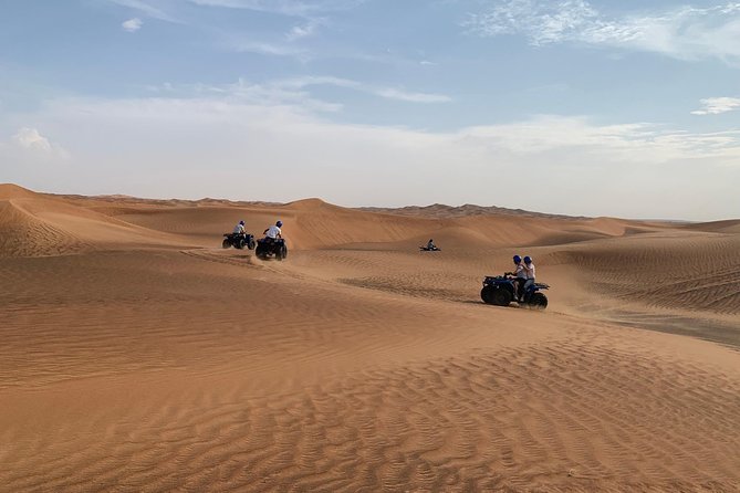 Dubai: Unique SUNSET Quad Bike Red Dunes Safari - Sandboarding adds a simple challenge