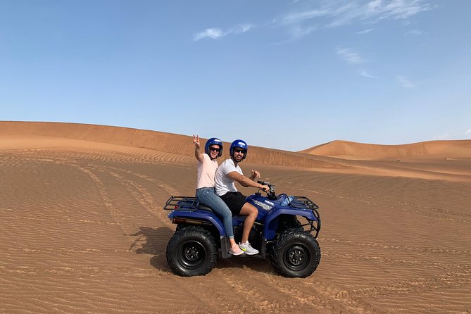 Dubai: Unique SUNSET Quad Bike Red Dunes Safari - Sunset is the day’s best pause
