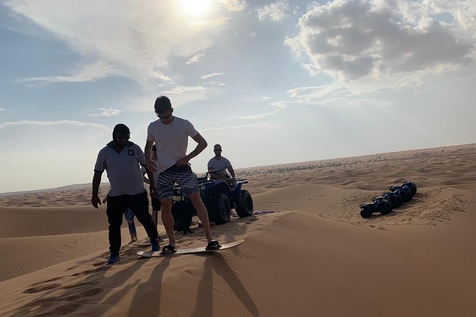 Dubai: Unique SUNSET Quad Bike Red Dunes Safari - Who will enjoy this desert day most