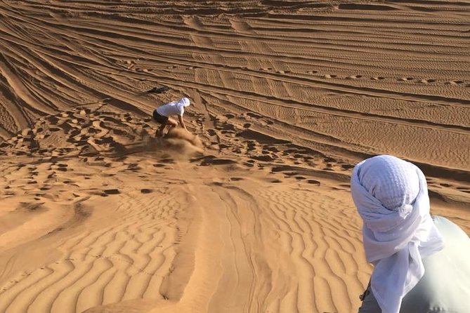 Dubai: Unique SUNSET Quad Bike Red Dunes Safari - The one-hour quad bike ride is the main event