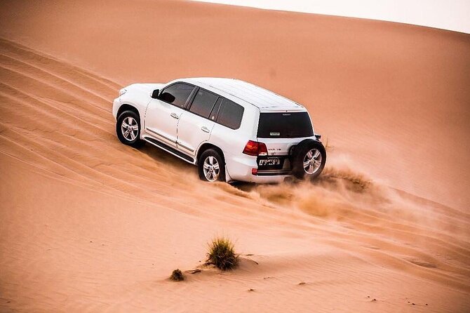 Dubia 4x4 Dune Bashing, Sandboarding, Camel Riding and Bbq Dinner - What the $29 Dubai desert safari includes