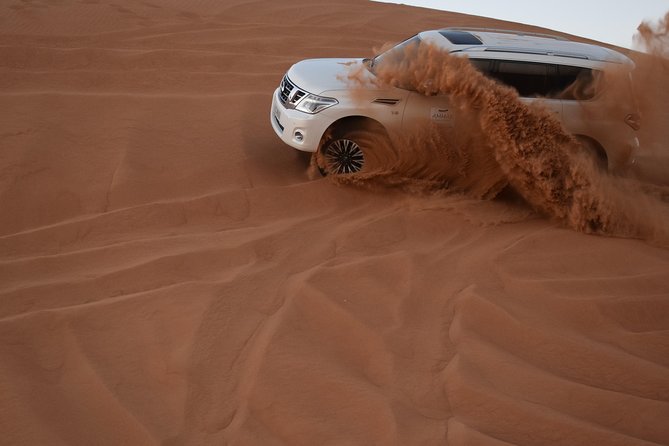 Dune Bashing with Quad Bike and Sand Boarding from Dubai - The long road from Dubai to the desert