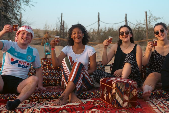 Evening Camel Caravan, Bedouin Dinner with Al Marmoom Oasis - Arabian dress, falcon photos, and evening entertainment