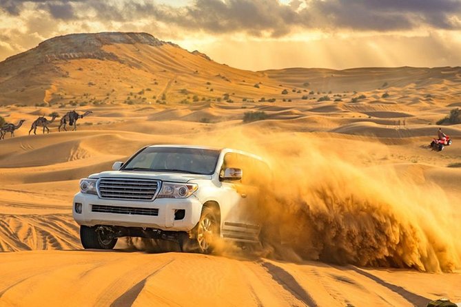 Evening Desert Adventure: Quad Biking, Sandboarding & Camel Ride - Leaving Dubai for the Lahbab red dunes