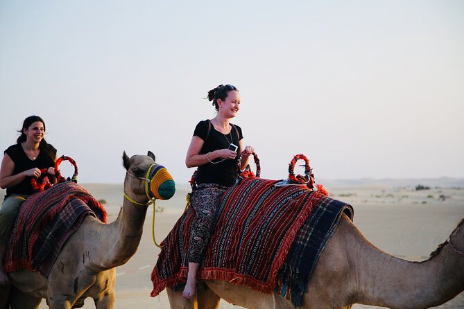 Evening Desert Safari Abu Dhabi with Hot BBQ Dinner - The Arabian-style camp after sunset
