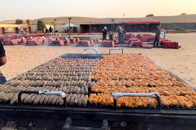 Evening Desert Safari BBQ Dinner With Quad Bike & Sand boarding - A short camel ride and camp welcome