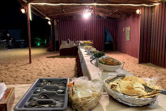 Evening Desert Safari BBQ Dinner With Quad Bike & Sand boarding - Sandboarding with room for a few attempts