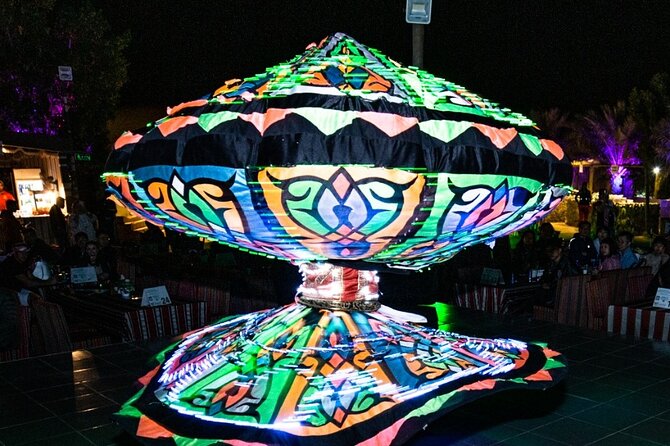 Evening Desert Safari Camel Ride Dinner Live Shows in Abu Dhabi - Camel riding and sandboarding between the dunes