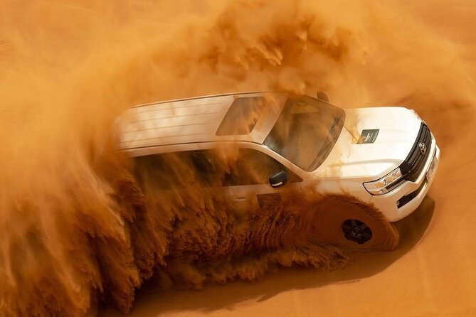 Evening Desert Safari Dubai BBQ Dinner Dune Bashing Dune Buggy - Leaving Dubai for the red dunes