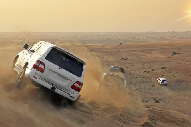 Evening Desert Safari Dubai with BBQ Dinner - Dune bashing is the high-energy centerpiece
