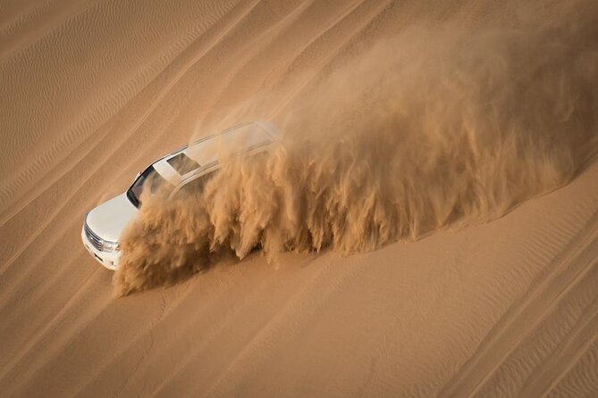 Evening Desert Safari Dubai with BBQ Dinner & Shows - Belly dance, Tanura, and fire performances