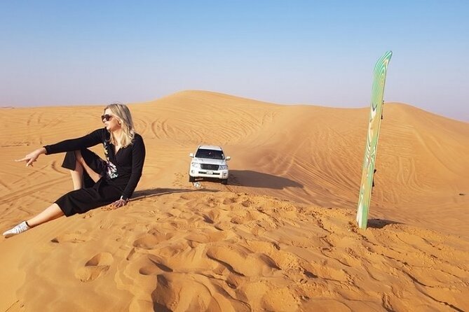 Evening Desert safari Dubai With Quad Bike Ride & BBQ dinner - The short camel ride