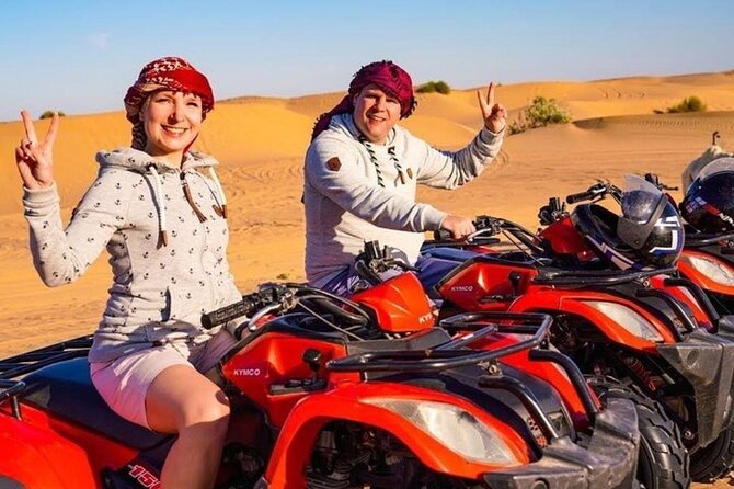 Evening Desert Safari from Dubai with Quad Bike Ride - Quad biking across the red dunes