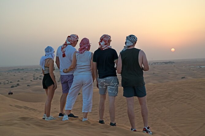 Evening Desert Safari in Dubai, Sandboard & BBQ Dinner - Falconry adds another desert tradition