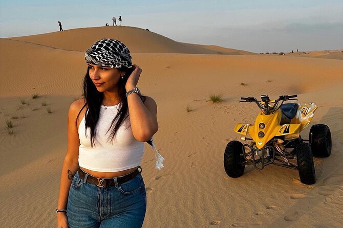 Evening Desert Safari Quad Bike and Live BBQ - Belly dancing, fire, and Tanura finish the night