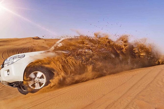 Evening Desert Safari Tour with Sand Surfing, BBQ Dinner (Exclusive Car) - Sandboarding and sunset photographs