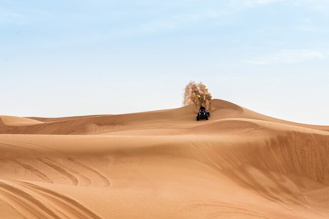 Evening Desert Safari with ATV Quad Bike Dune Bashing BBQ Dinner - Leaving Dubai in a 4x4