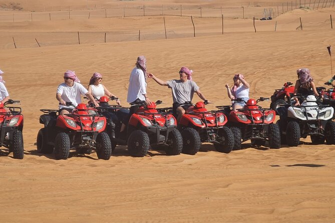 Evening Desert Safari with BBQ Buffet Camel Ride and Arabic Shows - Arabic dress, henna, and desert photographs