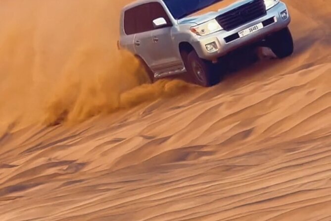 Evening Desert Safari with BBQ Buffet Camel Ride and Arabic Shows - BBQ buffet, drinks, and a busy camp evening
