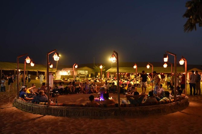 Evening Desert Safari with BBQ Dinner & 7 Live Show's - Camel Riding, Sandboarding, Henna, and Sheesha