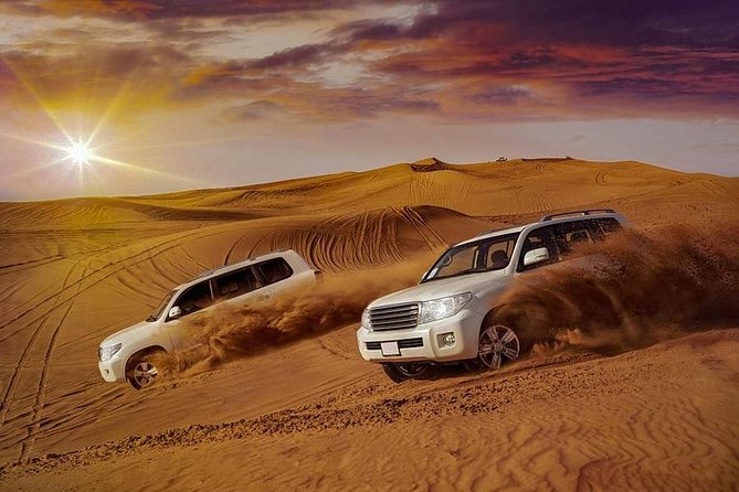 Evening Desert Safari with Belly Dance and BBQ Dinner and Camel Ride - Camel ride and sandboarding in the dunes