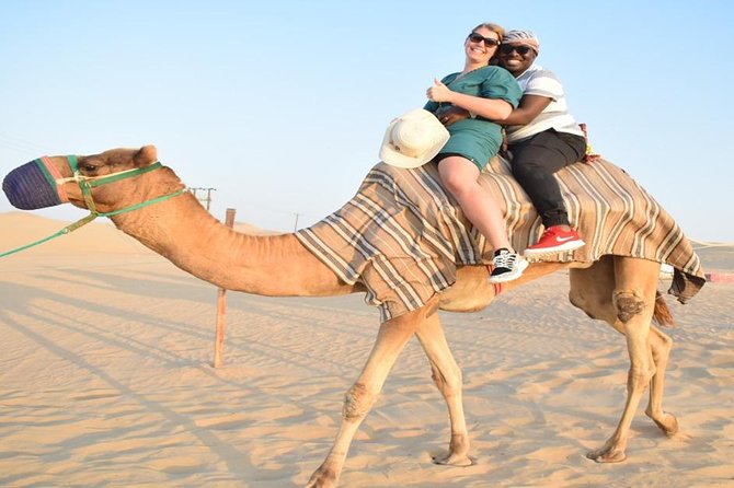 Evening Desert Safari with, Dune Bashing, Camel Ride, sand board - A four-hour desert sampler from Dubai