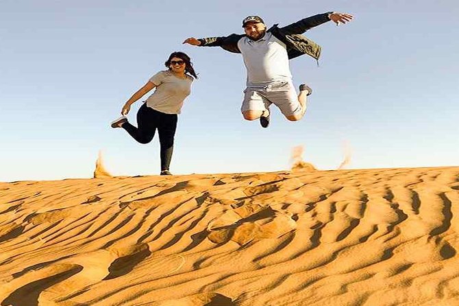 Evening Desert Safari with, Dune Bashing, Camel Ride, sand board - The desert camp brings in the cultural side