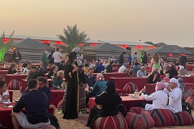 Evening Desert Safari with Quad Bike, Camel Ride & BBQ Dinner - Sunset over the red-sand dunes