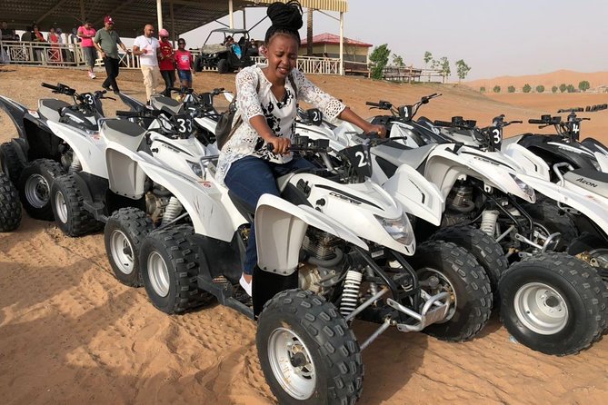 Evening Desert Safari with Quad Bike, Dune Bashing, Entertainments, BBQ Dinner - High dunes, sandboarding, and sunset photographs
