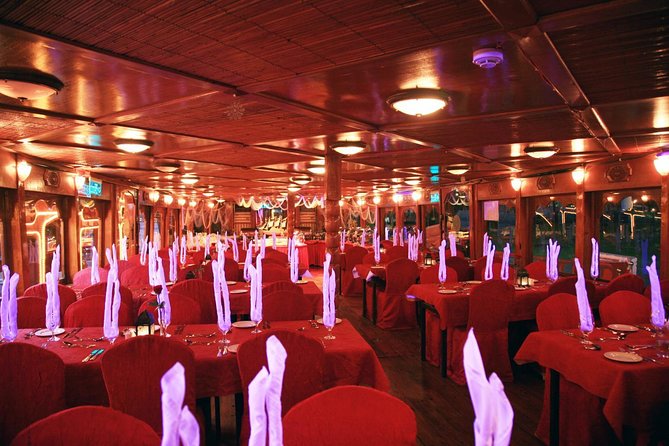 Evening Dhow Dinner Cruise in Dubai - Boarding the light-festooned wooden dhow