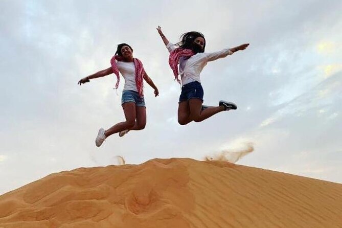 Evening Dubai Desert Safari Experience with Dinner and Shows - Tanoura, fire, and belly dance after dark