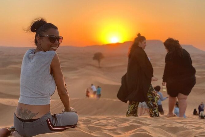 Evening Dubai Desert Safari Experience with Dinner and Shows - Transport, timing, and group size
