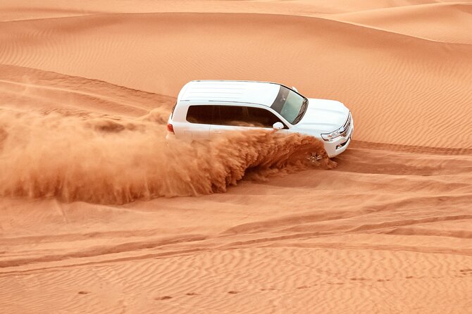 Evening Dubai Desert Safari, Red Sand, Premium camp shows & Diner - Key points at a glance